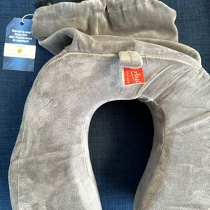 Ariel neck pillow. New in self contained cover.